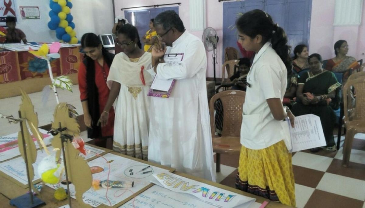 Exhibition of tabletop models on World AIDS Day